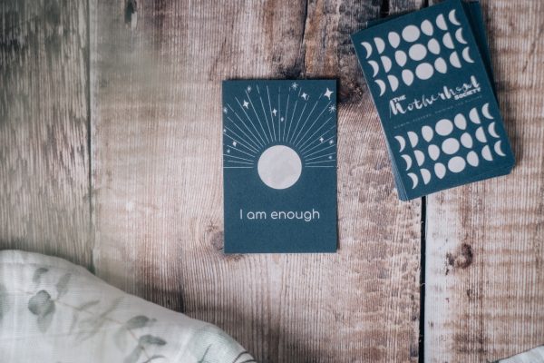 Moon affirmation card with a hand drawn image of the moon and the mantra “I am enough”