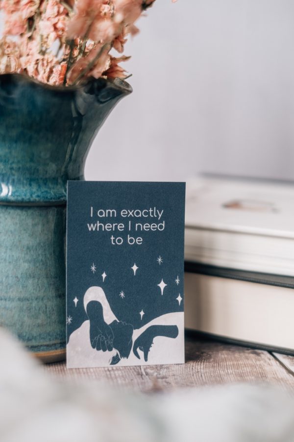 Moon affirmation card with the mantra “i am exactly where I need to be” with a hand drawn illustration of a reclining woman
